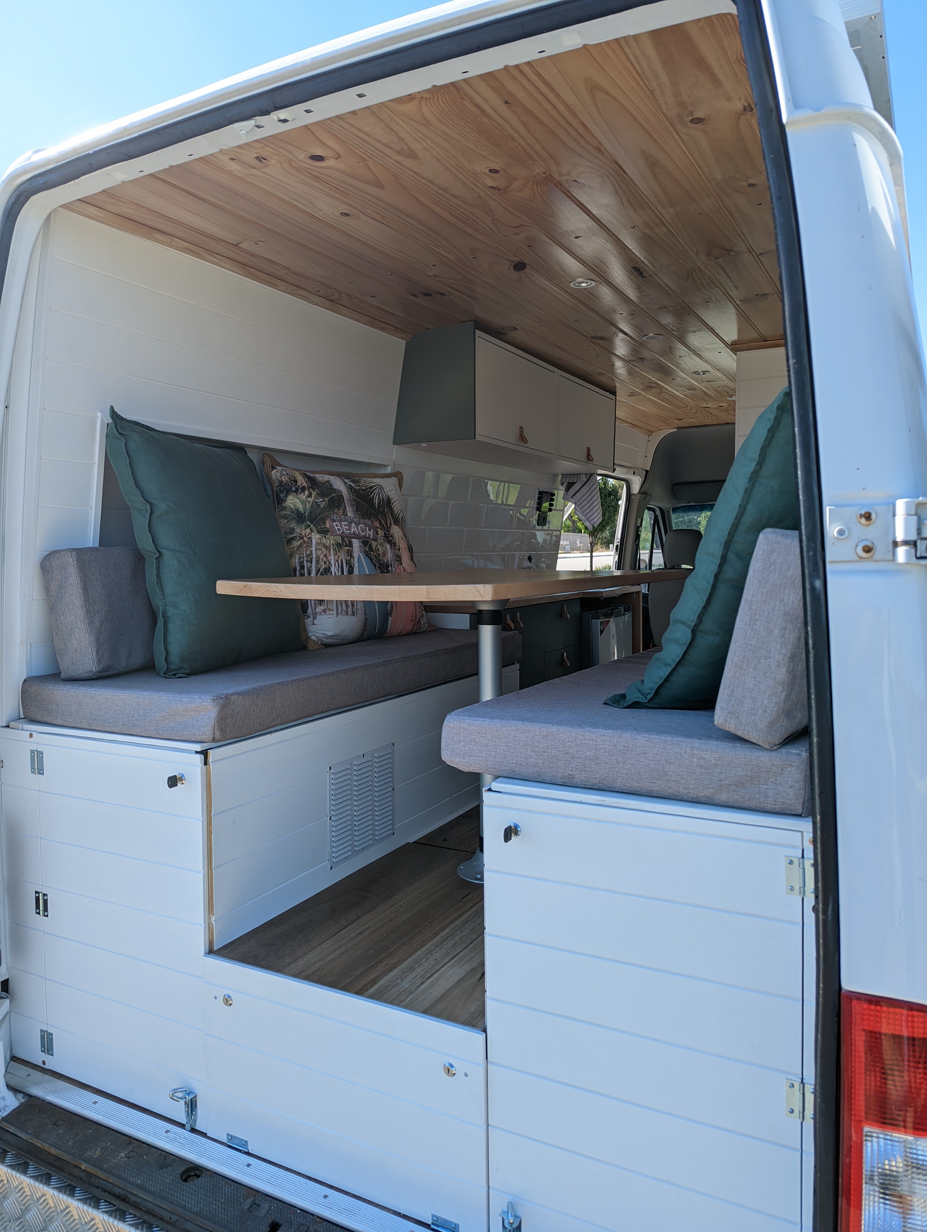 Campervan build stage showing electrical and cabinetry work